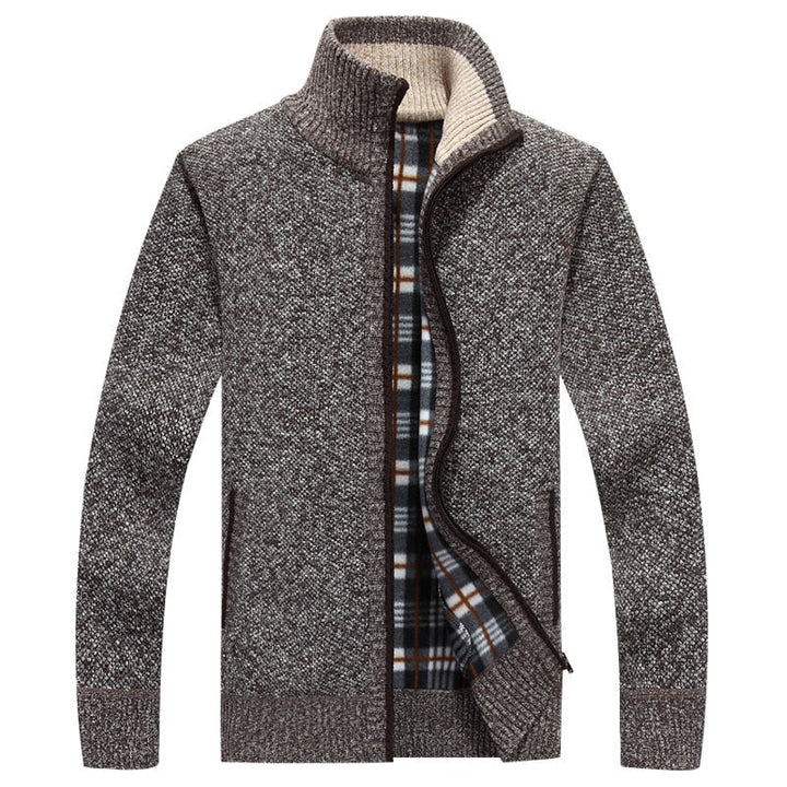 "Stijlvol herenwintervest, beige, blokjespatroon, warme voering. Perfect voor casual en extra warme outfits in de winter."