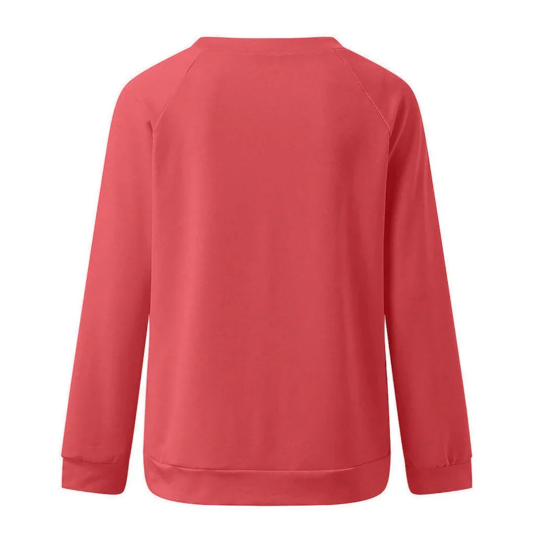 Stijlvolle Aria damestrui met 'Just Breathe' print, warme acrylstof, ronde hals, en lange mouwen voor comfort en stijl.