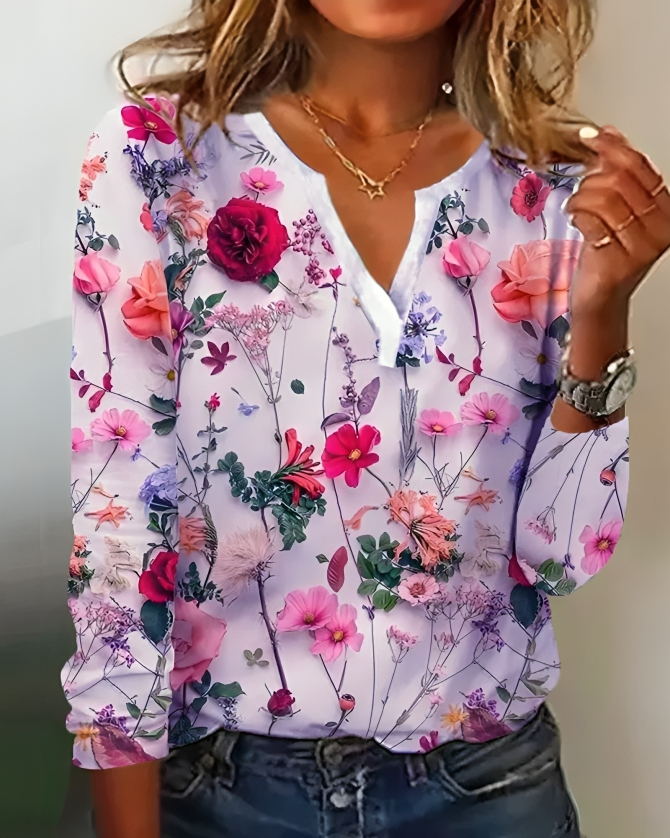 "Stijlvolle dames bloemenblouse met V-hals, levendig patroon, comfort en veelzijdig geschikt voor elke gelegenheid."