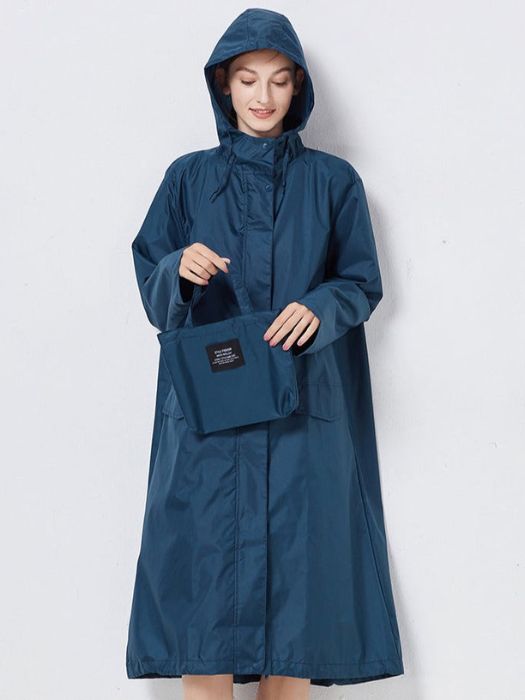 Stijlvolle dames windjas in blauw, groen of zwart, weerbestendig en elegant, verkrijgbaar in meerdere maten.