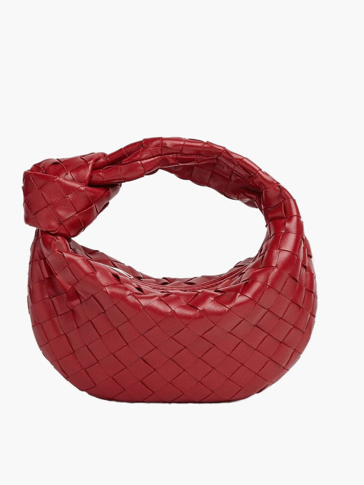 "Stijlvolle geweven mini tas met rijke texturen, handgemaakt vakmanschap, ideaal als veelzijdig accessoire voor vrouwen."