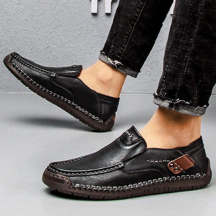"Stijlvolle GS heren loafers met orthopedische zool, donkerbruin leer, geschikt voor formele en casual gelegenheden."