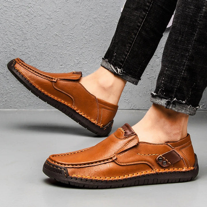 "Stijlvolle GS heren loafers met orthopedische zool, donkerbruin leer, geschikt voor formele en casual gelegenheden."