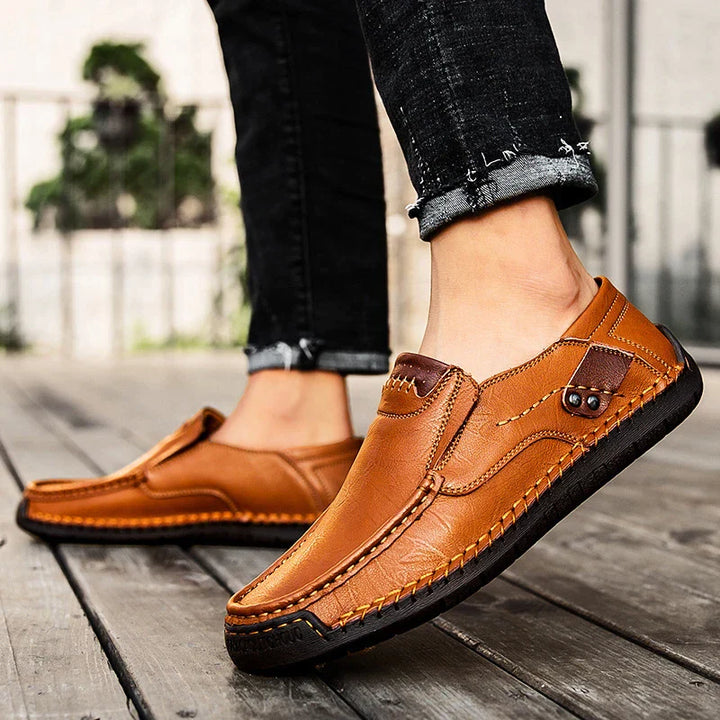 "Stijlvolle GS heren loafers met orthopedische zool, donkerbruin leer, geschikt voor formele en casual gelegenheden."