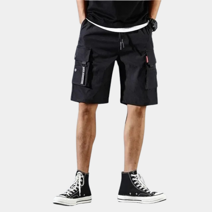 "Stijlvolle heren cargo shorts in grijs, khaki en zwart met praktische zakken, ideaal voor comfort en casual stijl."