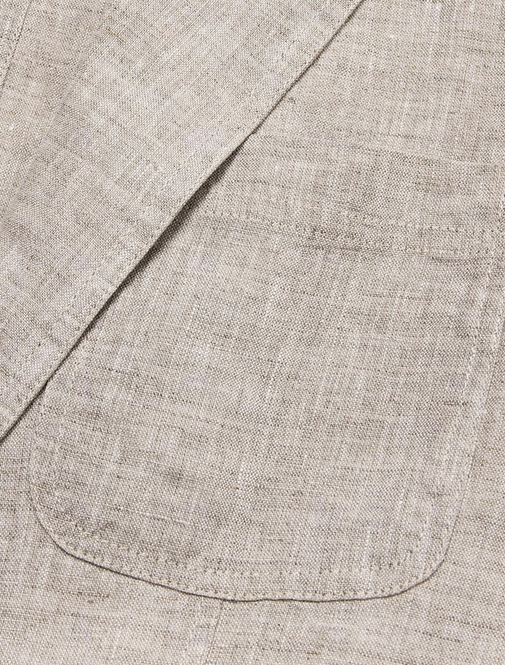"Stijlvolle heren linnen blazer in beige, luchtig en ademend, perfect voor warme zomerdagen en vele gelegenheden."
