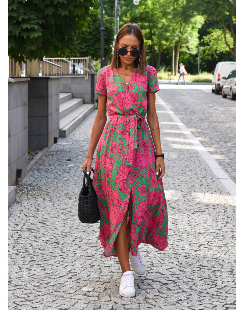 "Stijlvolle Jade Maxi Jurk met frisse bloemenprint, diepe V-hals en hoge split, ideaal voor zomerse dagen."