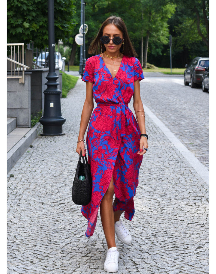 "Stijlvolle Jade Maxi Jurk met frisse bloemenprint, diepe V-hals en hoge split, ideaal voor zomerse dagen."
