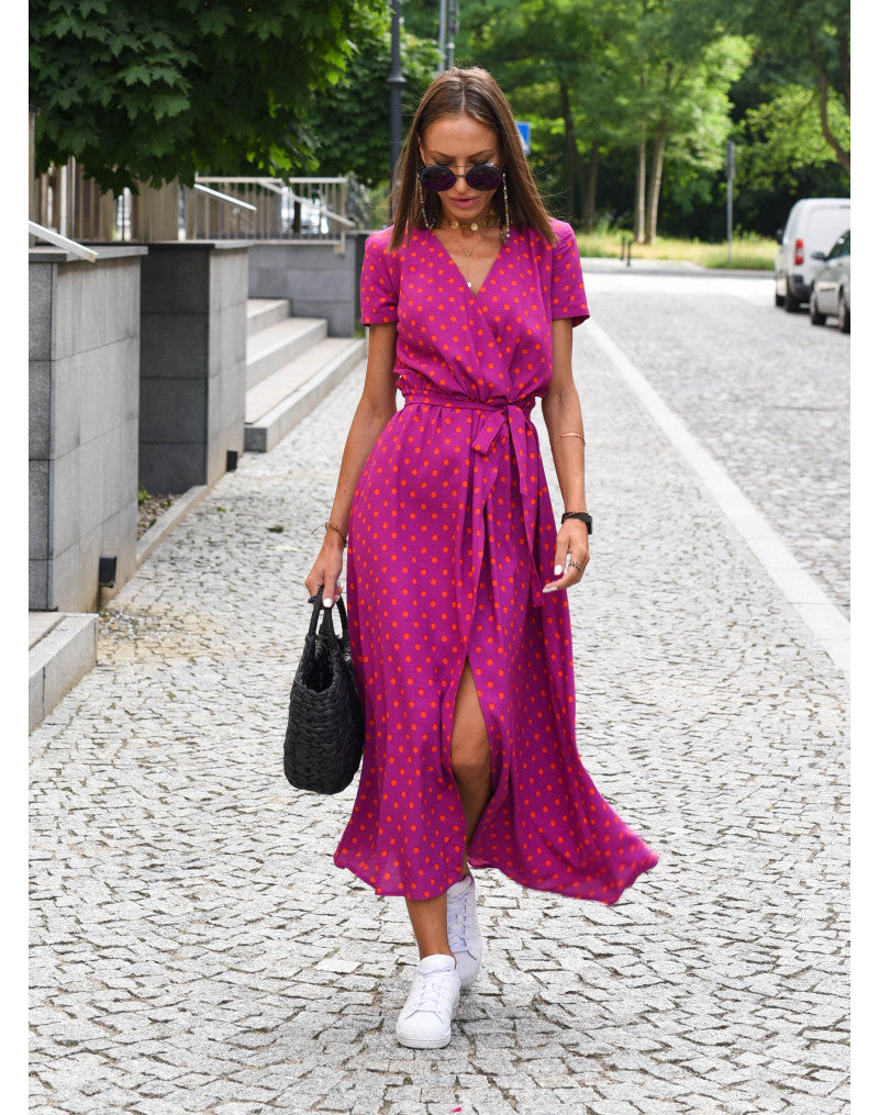 "Stijlvolle Jade Maxi Jurk met frisse bloemenprint, diepe V-hals en hoge split, ideaal voor zomerse dagen."