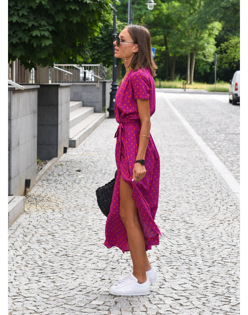 "Stijlvolle Jade Maxi Jurk met frisse bloemenprint, diepe V-hals en hoge split, ideaal voor zomerse dagen."