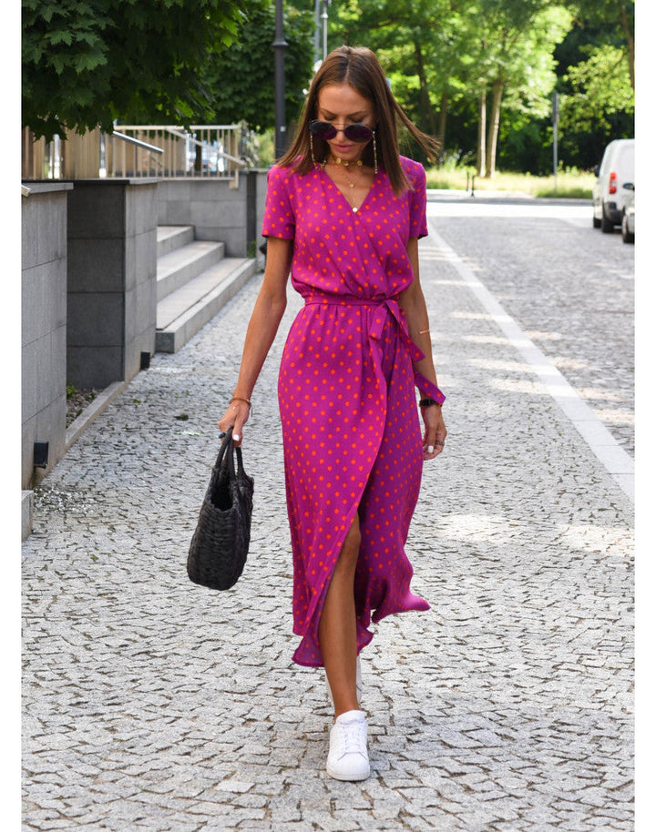 "Stijlvolle Jade Maxi Jurk met frisse bloemenprint, diepe V-hals en hoge split, ideaal voor zomerse dagen."