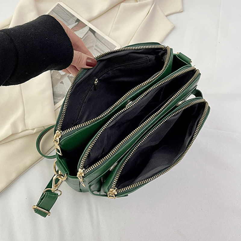 "Stijlvolle leren crossbody schoudertas met verstelbare riem in elegante kleur en ruime opbergruimte voor dames."