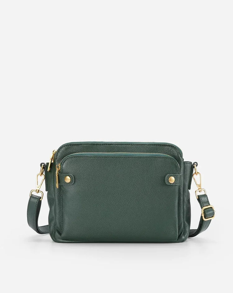 "Stijlvolle leren crossbody schoudertas met verstelbare riem in elegante kleur en ruime opbergruimte voor dames."