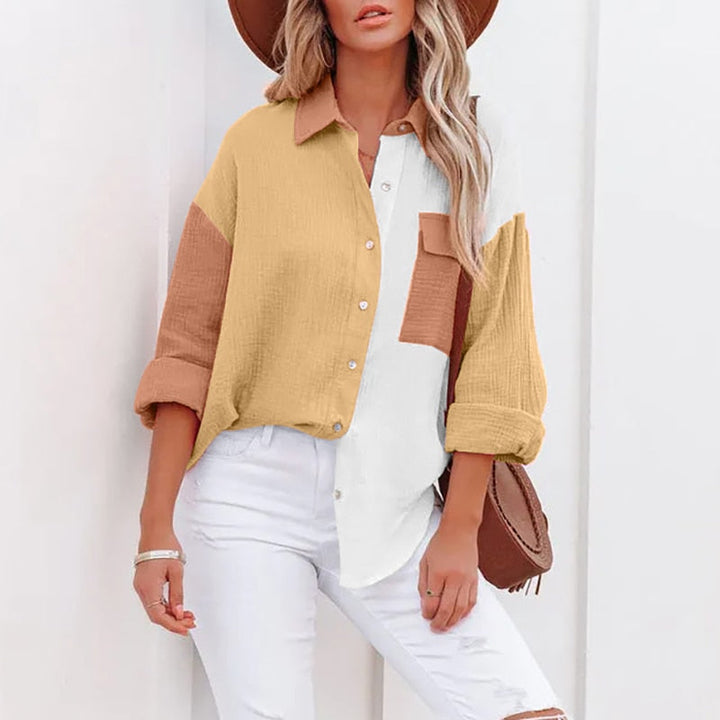 "Stijlvolle lichtgewicht zomerblouse voor dames met elegante moderne details, perfect voor warme dagen en veelzijdige looks."