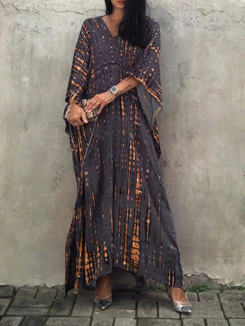 "Stijlvolle luchtige zomer kaftan maxi jurk voor dames, perfect voor stranddagen in exotisch design en ademende stof."