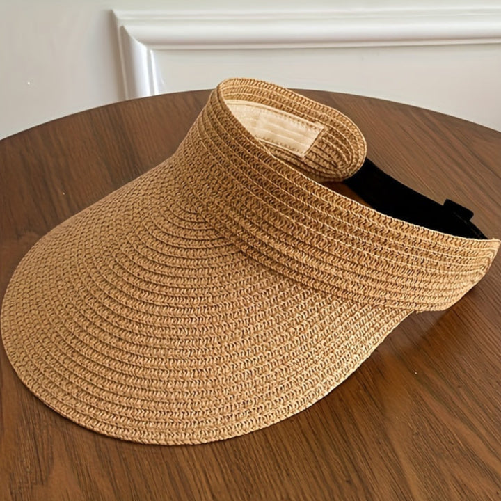 "Stijlvolle opvouwbare zonneklep met brede rand voor vrouwen, optimale bescherming tegen de zon, lichtgewicht en elegant."