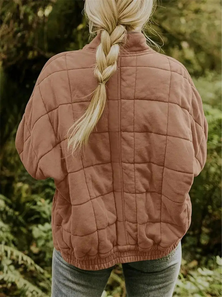 "Stijlvolle, oversized damesovergangsjas in meerdere kleuren zoals donkergrijs en groen, ideaal voor wisselend weer."