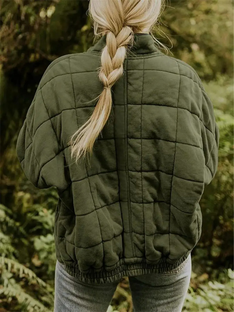 "Stijlvolle, oversized damesovergangsjas in meerdere kleuren zoals donkergrijs en groen, ideaal voor wisselend weer."