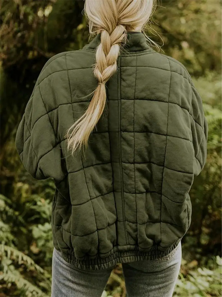 "Stijlvolle, oversized damesovergangsjas in meerdere kleuren zoals donkergrijs en groen, ideaal voor wisselend weer."