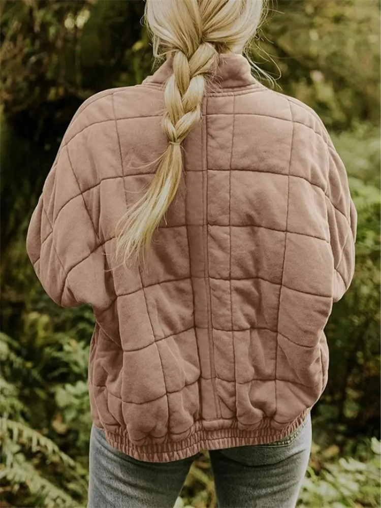 "Stijlvolle, oversized damesovergangsjas in meerdere kleuren zoals donkergrijs en groen, ideaal voor wisselend weer."