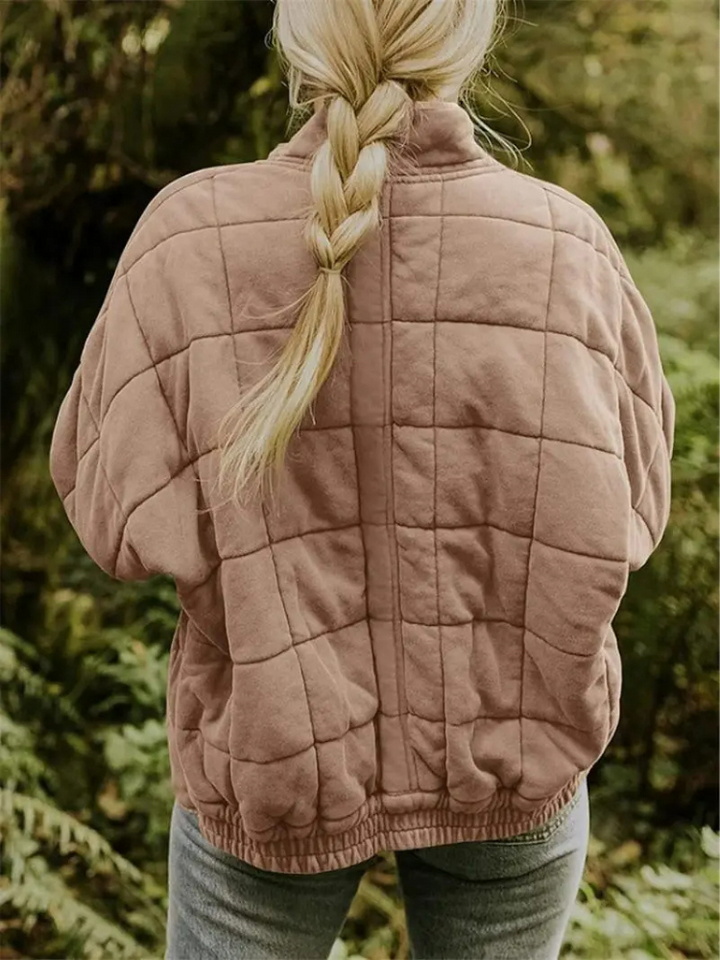 "Stijlvolle, oversized damesovergangsjas in meerdere kleuren zoals donkergrijs en groen, ideaal voor wisselend weer."
