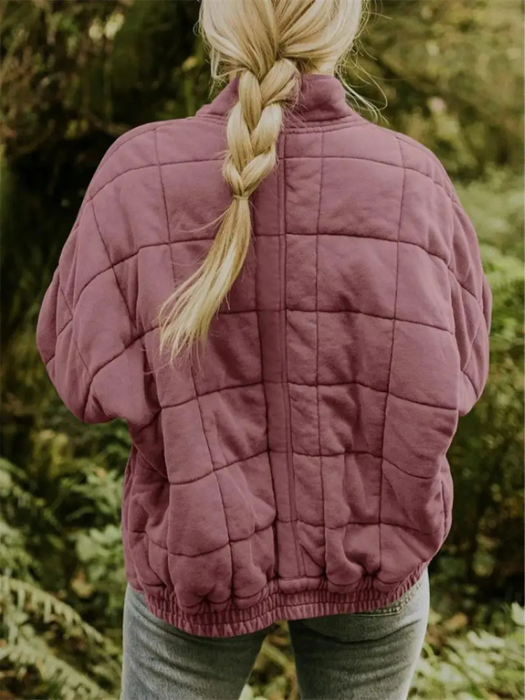 "Stijlvolle, oversized damesovergangsjas in meerdere kleuren zoals donkergrijs en groen, ideaal voor wisselend weer."