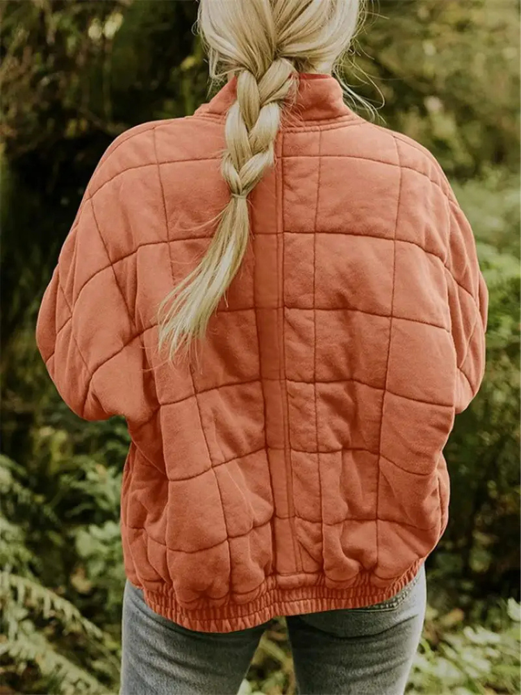 "Stijlvolle, oversized damesovergangsjas in meerdere kleuren zoals donkergrijs en groen, ideaal voor wisselend weer."