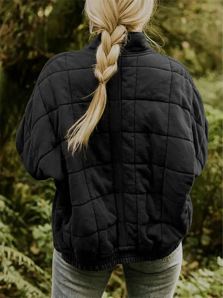 "Stijlvolle, oversized damesovergangsjas in meerdere kleuren zoals donkergrijs en groen, ideaal voor wisselend weer."
