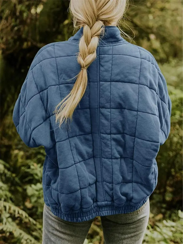 "Stijlvolle, oversized damesovergangsjas in meerdere kleuren zoals donkergrijs en groen, ideaal voor wisselend weer."