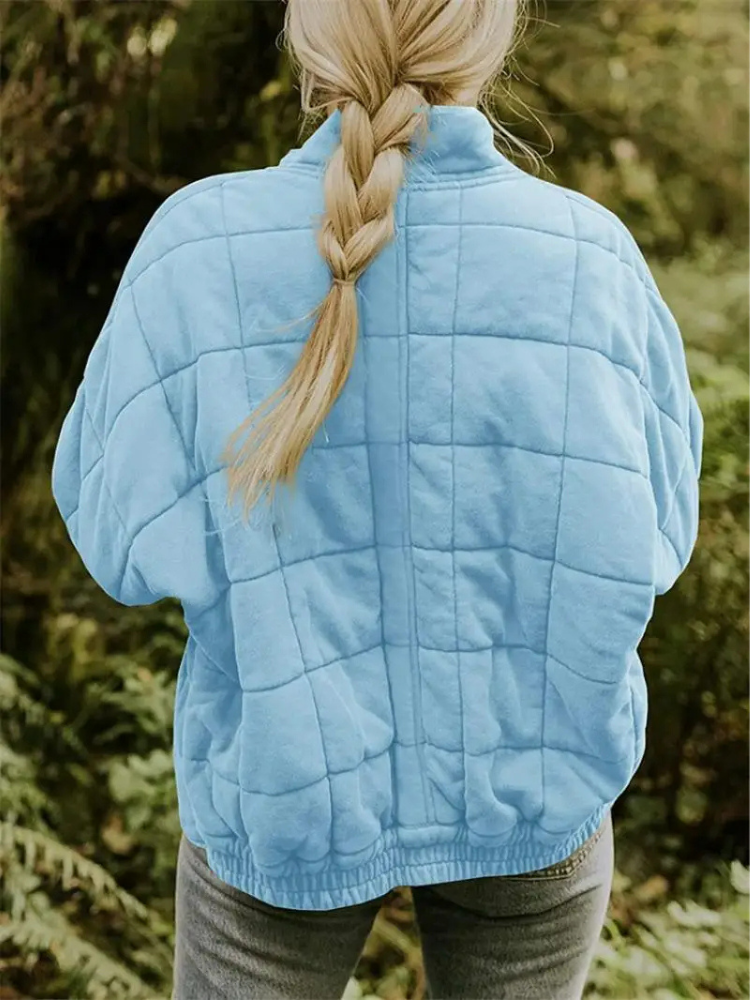 "Stijlvolle, oversized damesovergangsjas in meerdere kleuren zoals donkergrijs en groen, ideaal voor wisselend weer."
