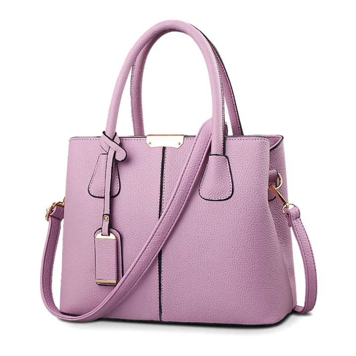 "Stijlvolle Romina Crossbody Draagtas in paars met strak, vierkant ontwerp en comfortabele band voor een elegante look."