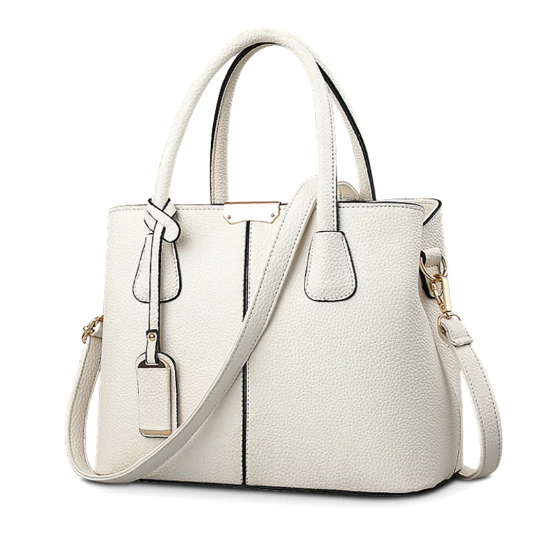 "Stijlvolle Romina Crossbody Draagtas in paars met strak, vierkant ontwerp en comfortabele band voor een elegante look."