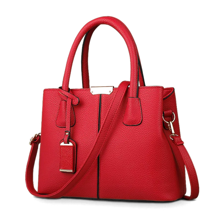 "Stijlvolle Romina Crossbody Draagtas in paars met strak, vierkant ontwerp en comfortabele band voor een elegante look."