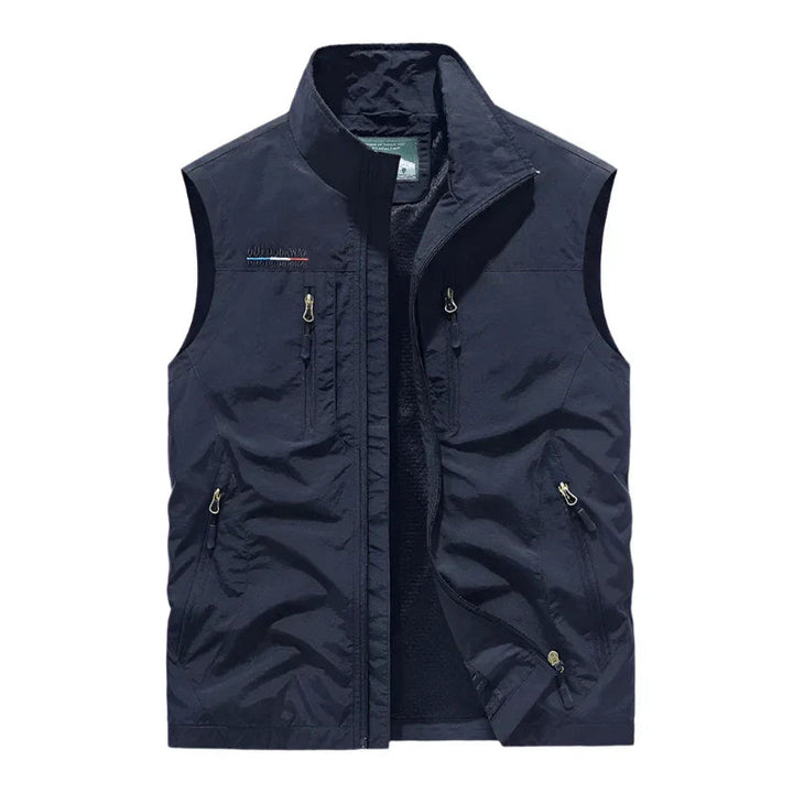 "Stijlvolle waterdichte bodywarmer heren, lichtgewicht, met meerdere zakken in zwart, blauw en groen, ideaal voor buiten."