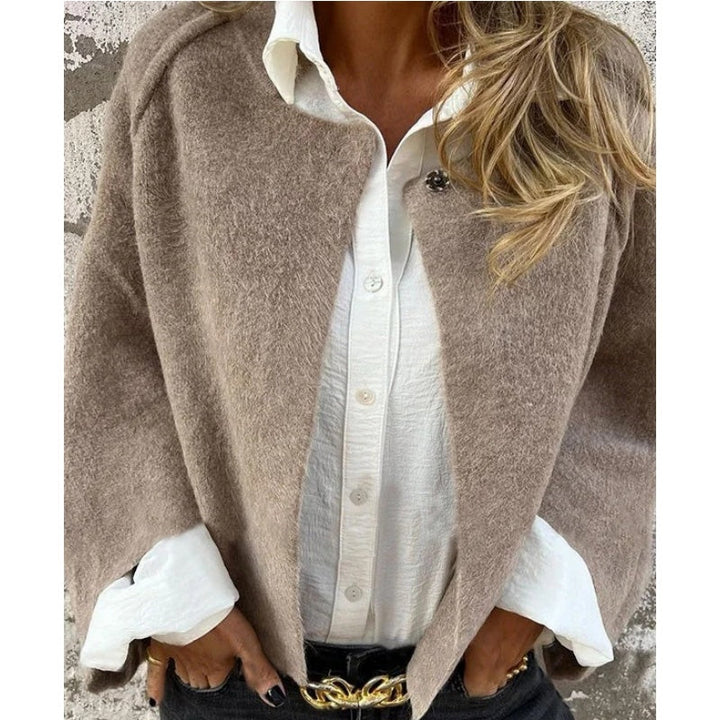 "Stijlvolle wolmix dames tussenjas in meerdere kleuren met harige textuur, oversized pasvorm en luxueuze uitstraling."