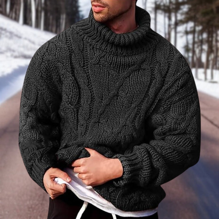 "Stijlvolle zwarte gebreide herentrui voor winter, biedt comfort en warmte, perfecte keuze voor veelzijdige garderobe."
