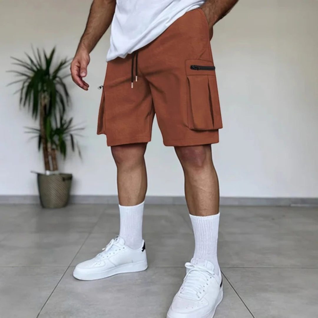 "Stoere lichtgewicht cargo shorts voor mannen, ademend katoenmix, meerdere zakken, ideaal voor zomeravonturen."