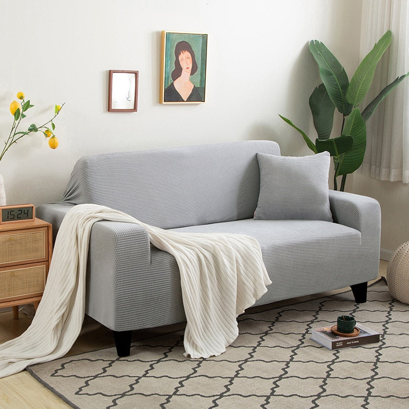 "StretchGuard rekbare bankhoes, elastisch, stijlvolle bescherming, antislip, perfecte pasvorm, modern interieurdesign"