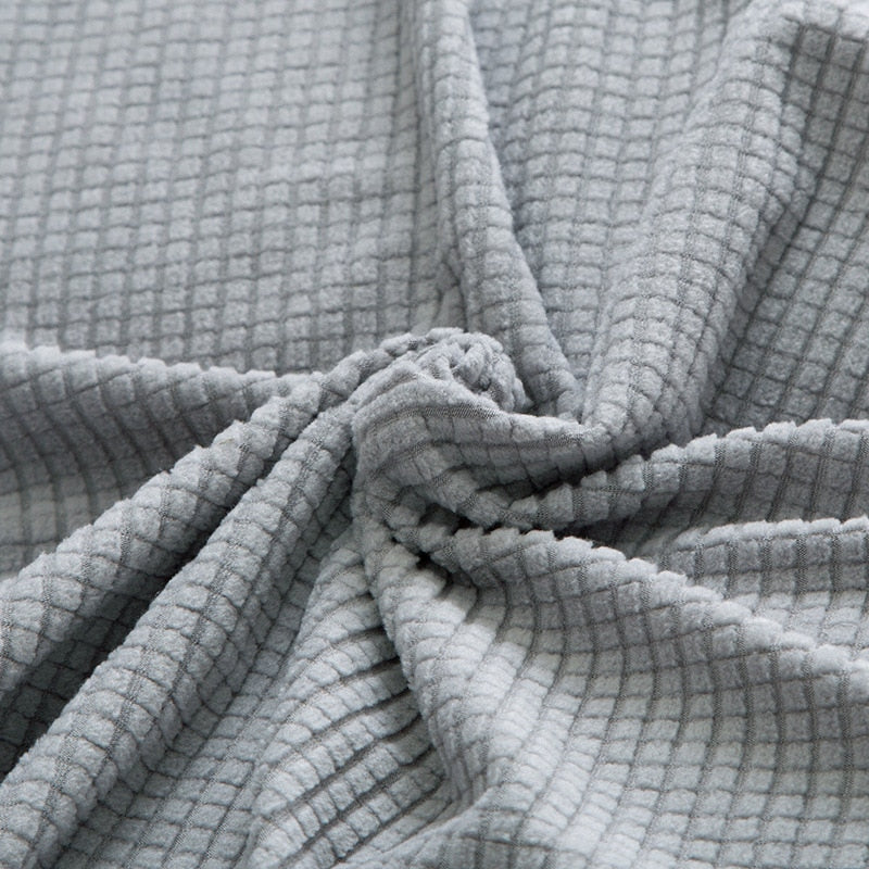 "StretchGuard rekbare bankhoes, elastisch, stijlvolle bescherming, antislip, perfecte pasvorm, modern interieurdesign"
