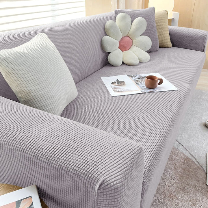 "StretchGuard rekbare bankhoes, elastisch, stijlvolle bescherming, antislip, perfecte pasvorm, modern interieurdesign"