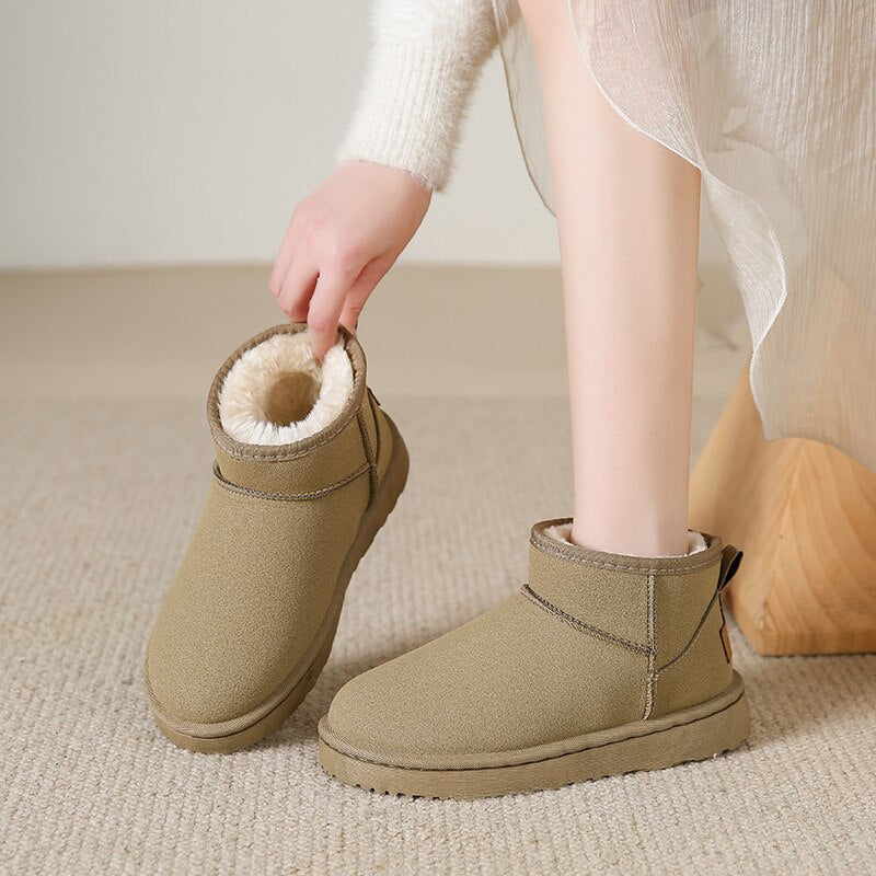 Stylische winter enkellaarzen voor dames met warme bontvoering, stevige zool, en elegant uiterlijk, ideaal voor koude dagen.