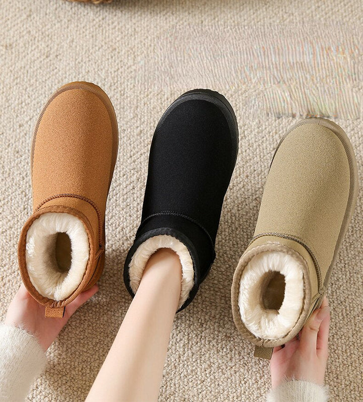 Stylische winter enkellaarzen voor dames met warme bontvoering, stevige zool, en elegant uiterlijk, ideaal voor koude dagen.