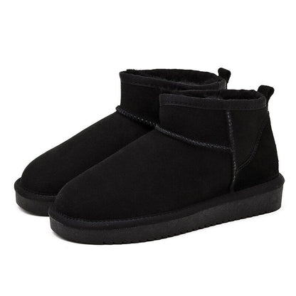 Stylische winter enkellaarzen voor dames met warme bontvoering, stevige zool, en elegant uiterlijk, ideaal voor koude dagen.