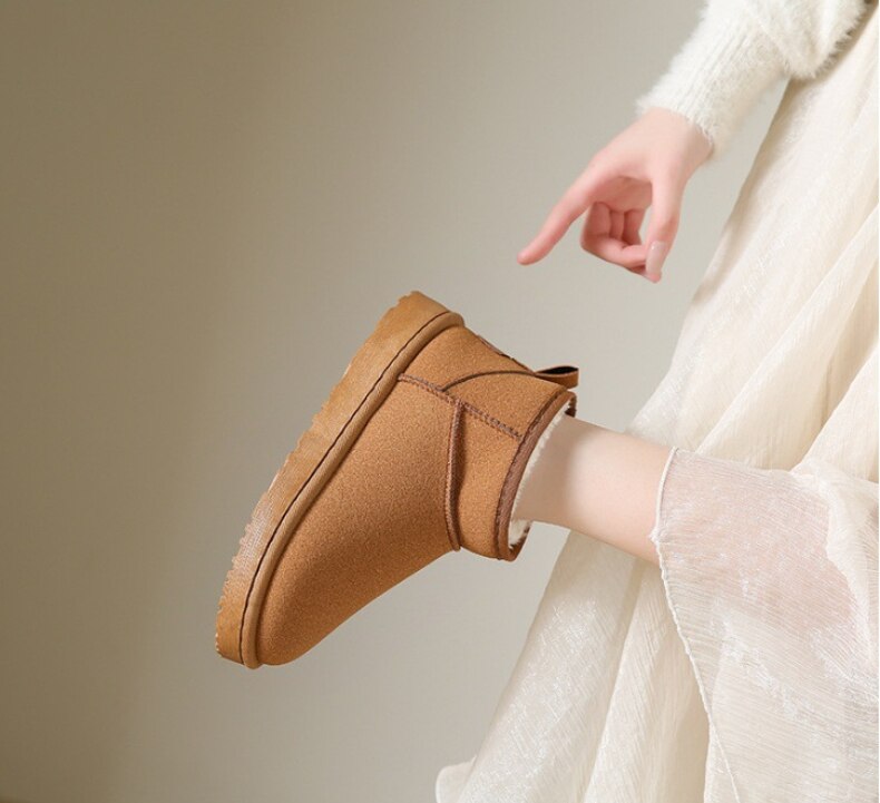 Stylische winter enkellaarzen voor dames met warme bontvoering, stevige zool, en elegant uiterlijk, ideaal voor koude dagen.
