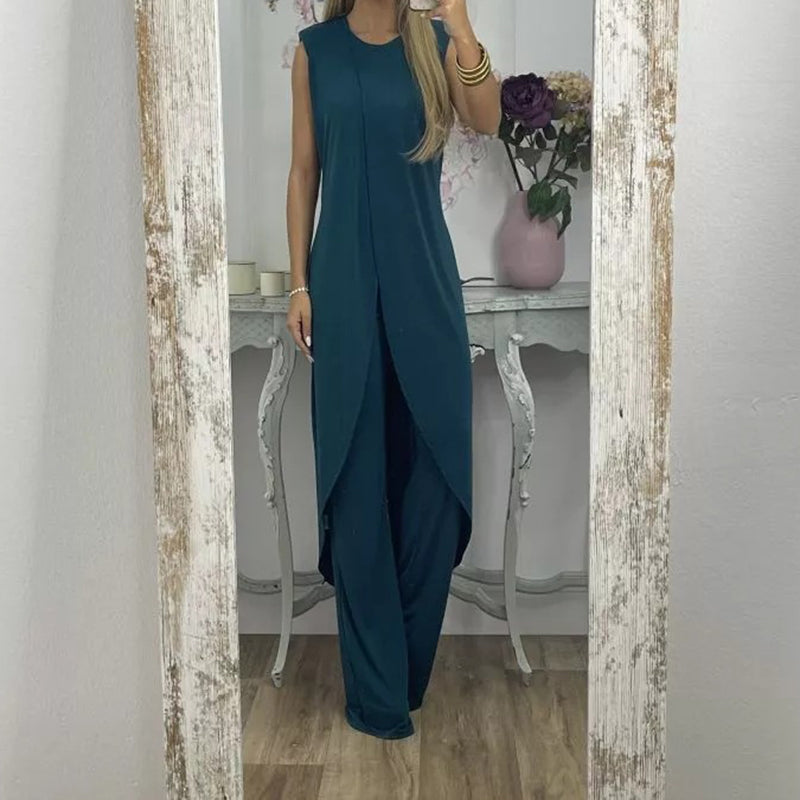"Sylvia tweedelige damesoutfit, elegante katoenen top en uitlopende broek, comfortabel en geschikt voor elke gelegenheid."