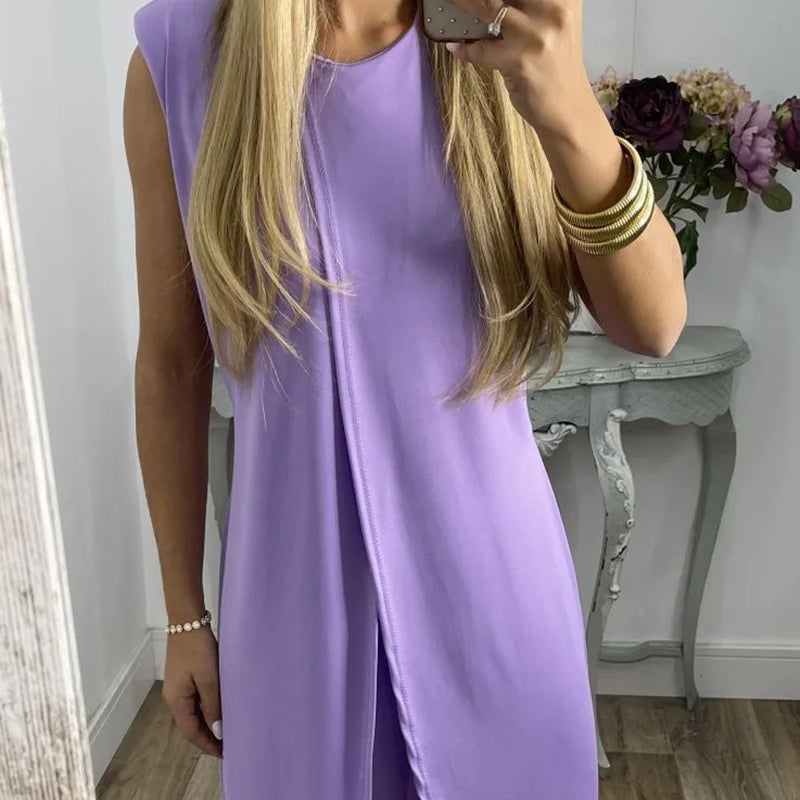 "Sylvia tweedelige damesoutfit, elegante katoenen top en uitlopende broek, comfortabel en geschikt voor elke gelegenheid."