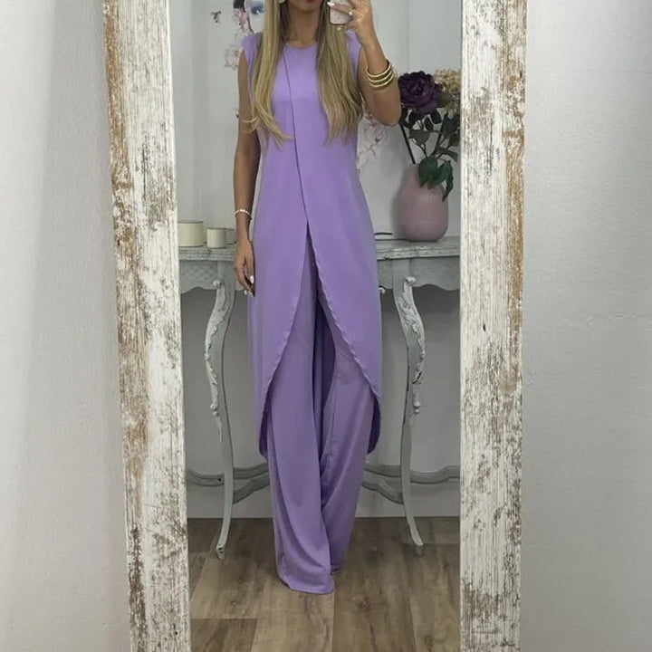 "Sylvia tweedelige damesoutfit, elegante katoenen top en uitlopende broek, comfortabel en geschikt voor elke gelegenheid."