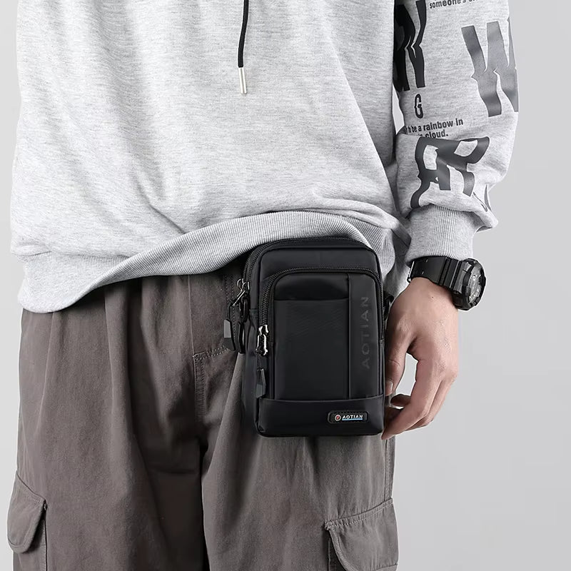 "Tactische heren crossbody tas, robuust ontwerp met meerdere opbergvakken, verstelbare riem, ideaal voor dagelijks gebruik."