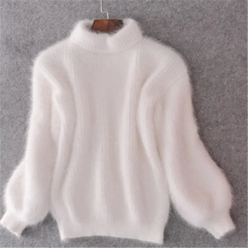 "Taylor Zachte Fluffy Trui in lichtblauw, zacht en comfortabel, ideaal voor herfst/winter, past bij casual outfits."