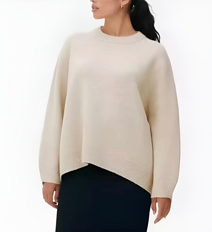 "Trendy oversized sweater in zachtroze met losse pasvorm, ideaal voor herfst en winter, perfect voor jeans en leggings."